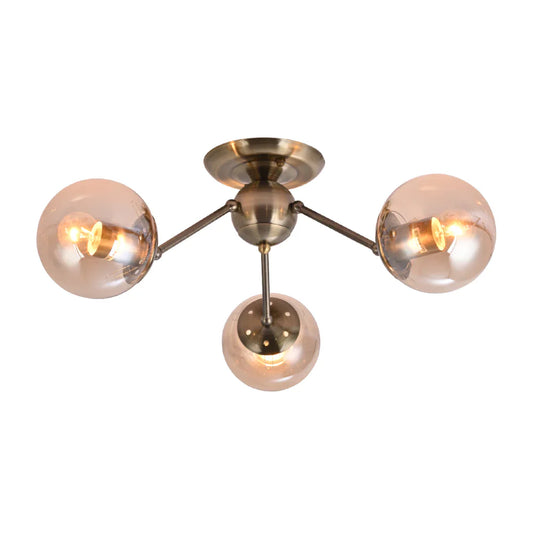 Atomic Elegance Brass & Amber Globe Light
