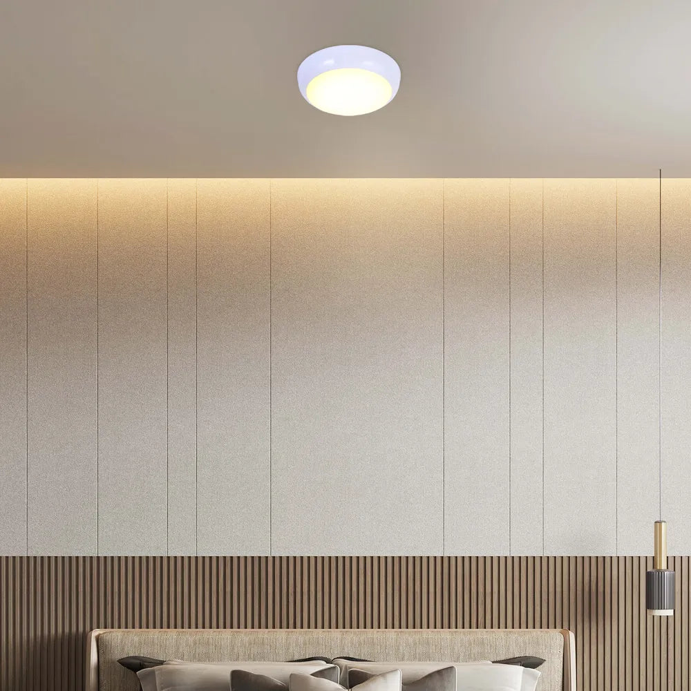 LED flush ceiling light in a modern kitchen, featuring a sleek white design, enhancing contemporary decor with bright, adjustable illumination.118-03620