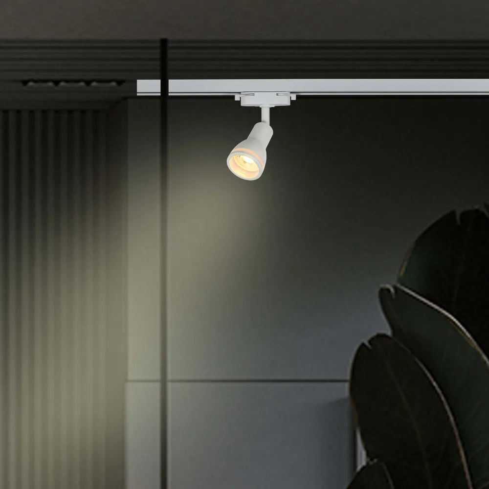 Tracklights GU10 in a modern living room setting, enhancing contemporary decor with warm, focused lighting for a stylish ambiance.173-03020