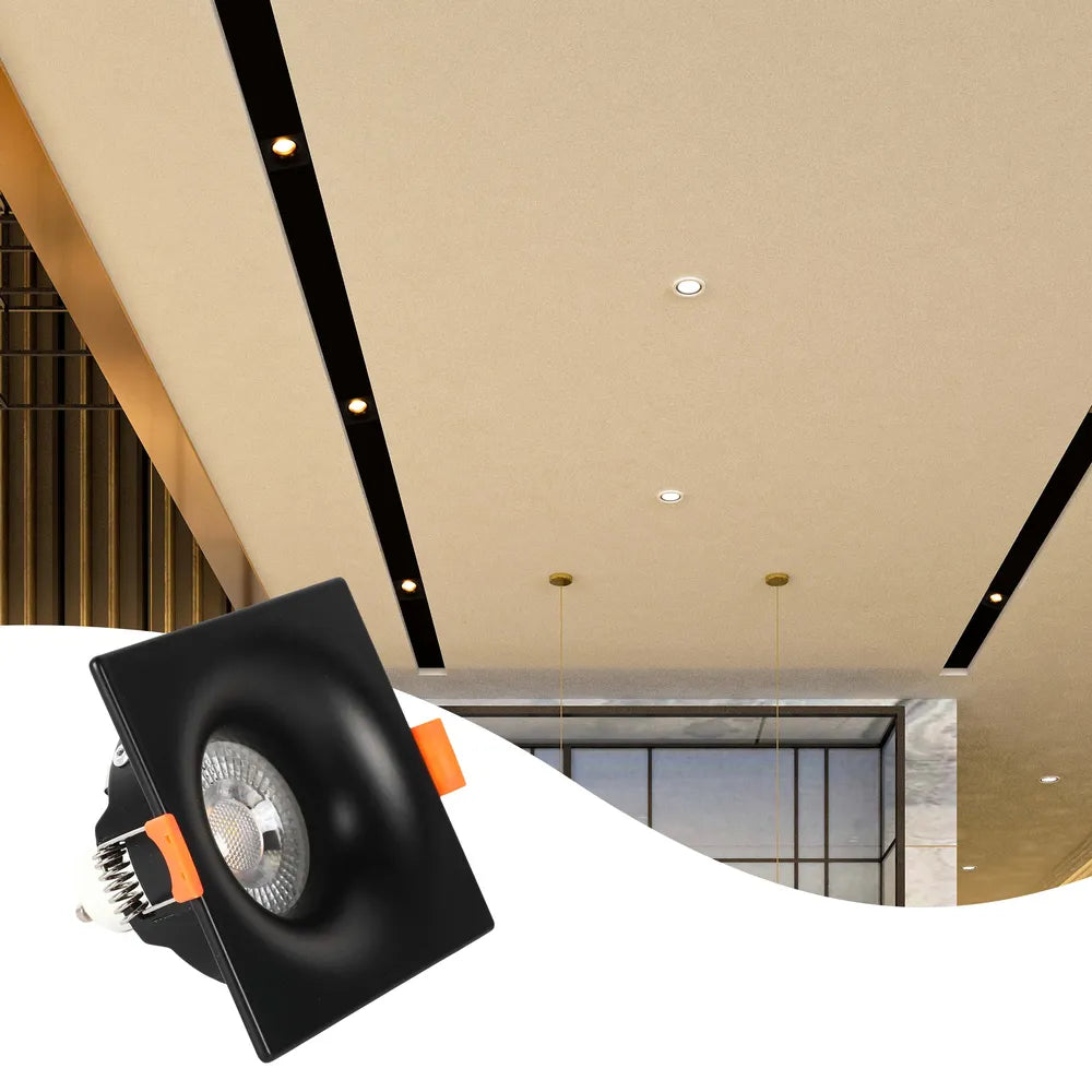 Sleek GU10 downlight fixture offers modern illumination in a contemporary living room, enhancing minimalist decor with a stylish touch.143-03994