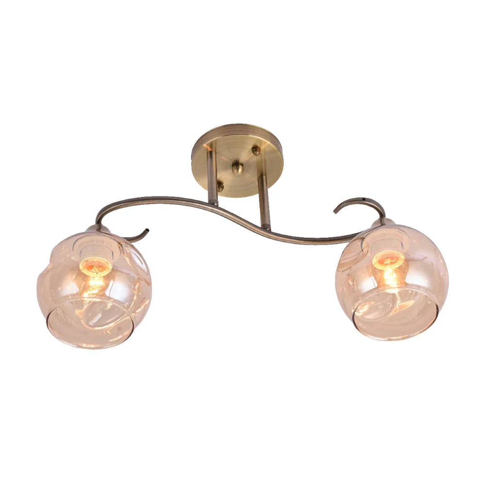 S-Curve Antique Brass and Dimpled Amber Globe Light