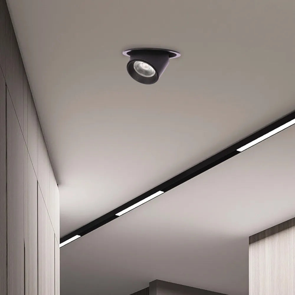 Modern LED downlight installed in a stylish living room, featuring a sleek design that complements contemporary decor and enhances ambiance.143-03408