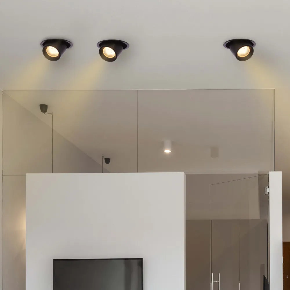 Sleek LED downlight in modern kitchen, illuminating stylish decor with adjustable gimbal for focused lighting. Perfect for contemporary spaces.143-03408