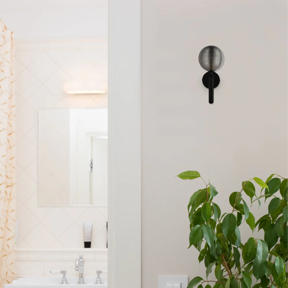 Black Striped Reeded Glass Wall Light in bathroom