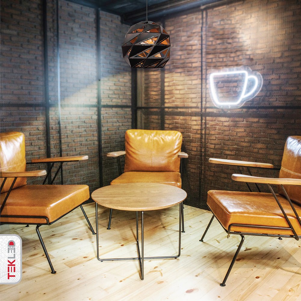 Black-golden metal polyhedral pendant light l with e27 fitting in an indoor setting foyer lobby